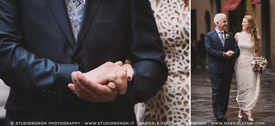 038-father-of-the-bride-hold-her-hand-while-walking-in-florence-street