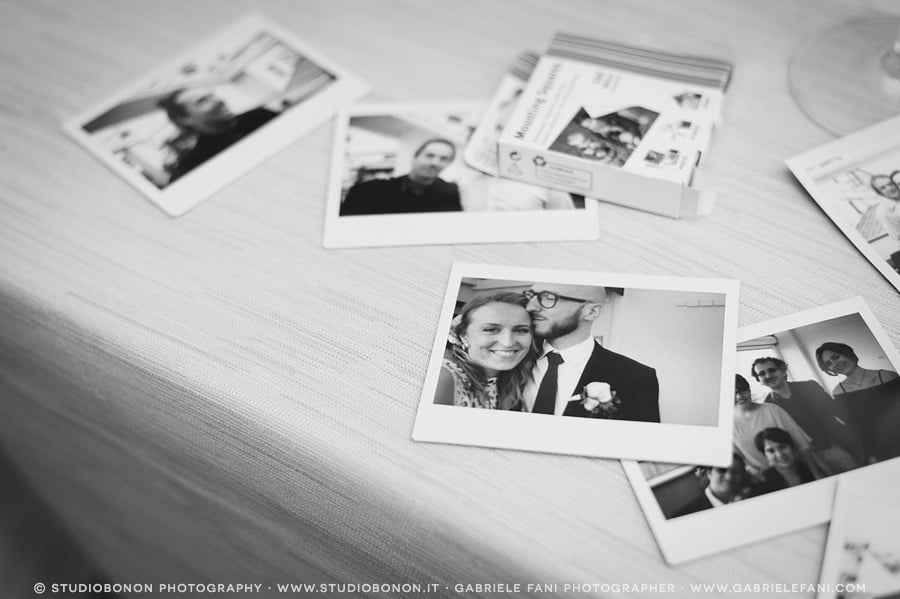 080-bride-and-groom-instant-pictures-polaroid-wedding-reception