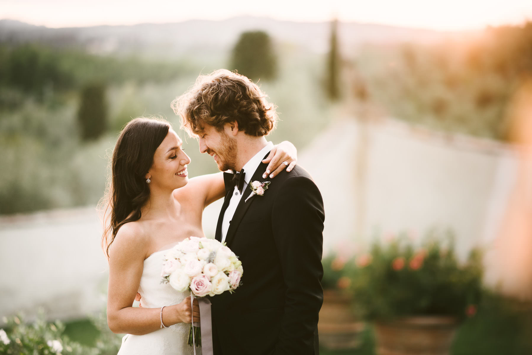 Tuscan Wedding gorgeous elegant bride in Vera Wang gown and groom wedding portrait at Villa Medicea di Lilliano Wine Estate in Florence countryside