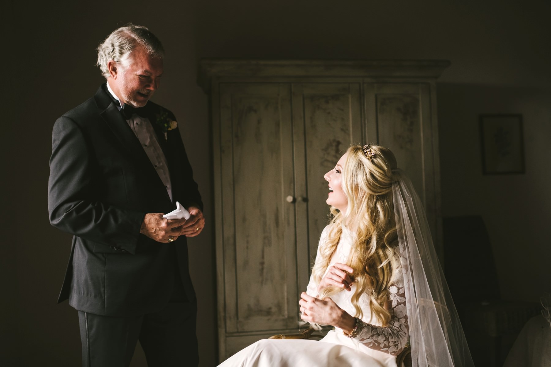 Father daughter exchange of gift intimate destination wedding in Tuscany
