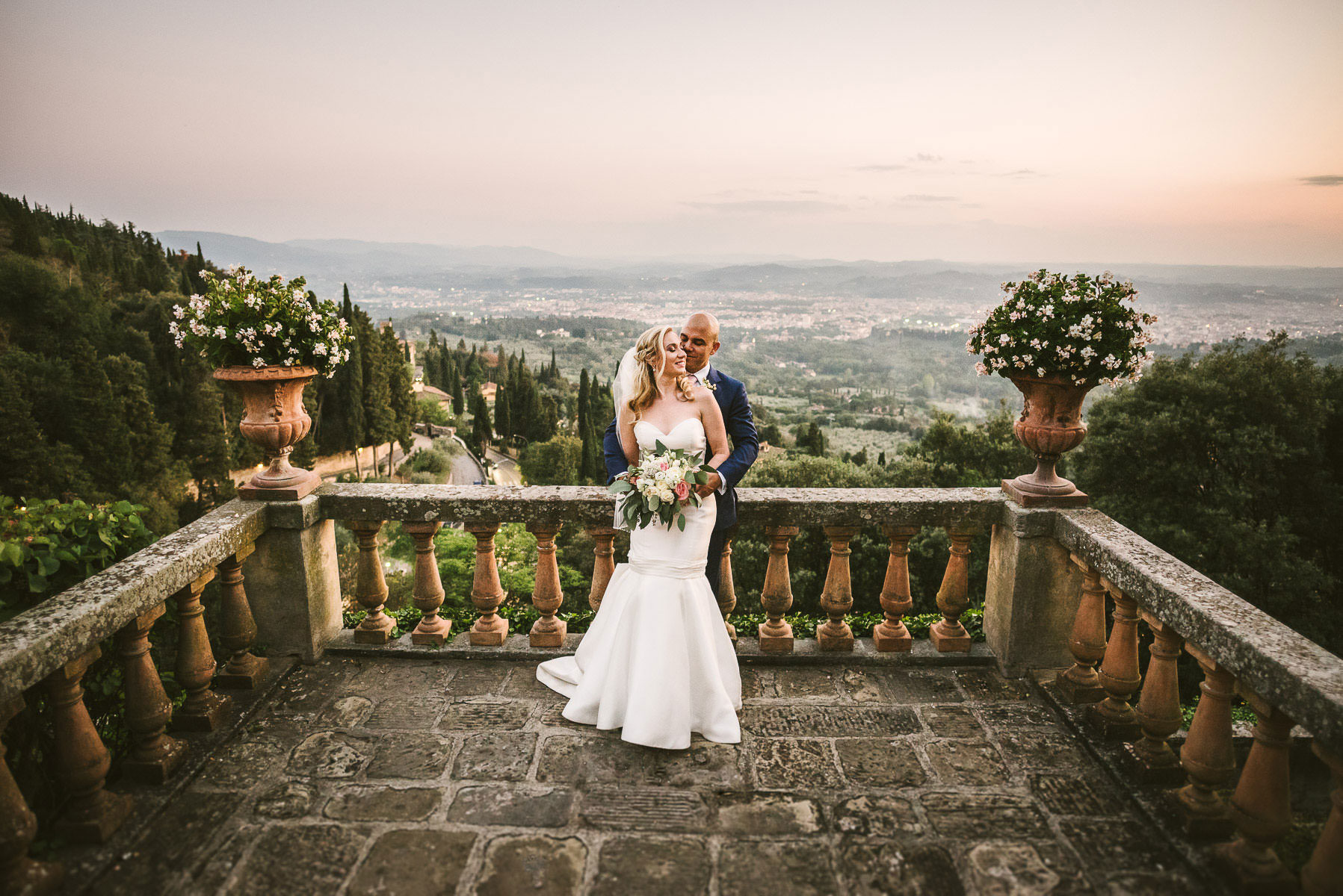 Gorgeous bride and groom share a lovely and unforgettable moment at Belmond Villa San Michele luxury venue near Florence