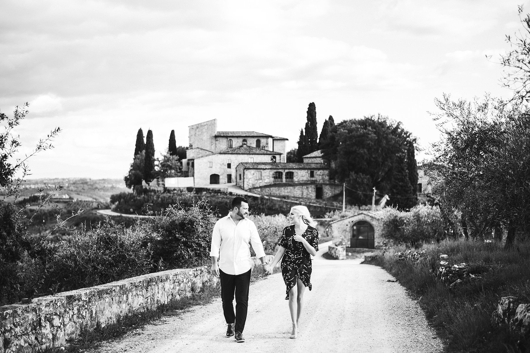 Lovely couple portrait candid honeymoon vacation photo shoot in Tuscany countryside at Castello La Leccia