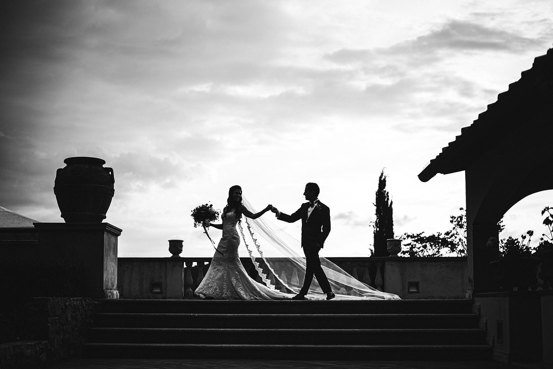 Elegant and charming wedding photo. La Dolce Vita style destination wedding in Italy at historic estate of Villa La Selva Wine Resort located in the heart of Tuscany countryside