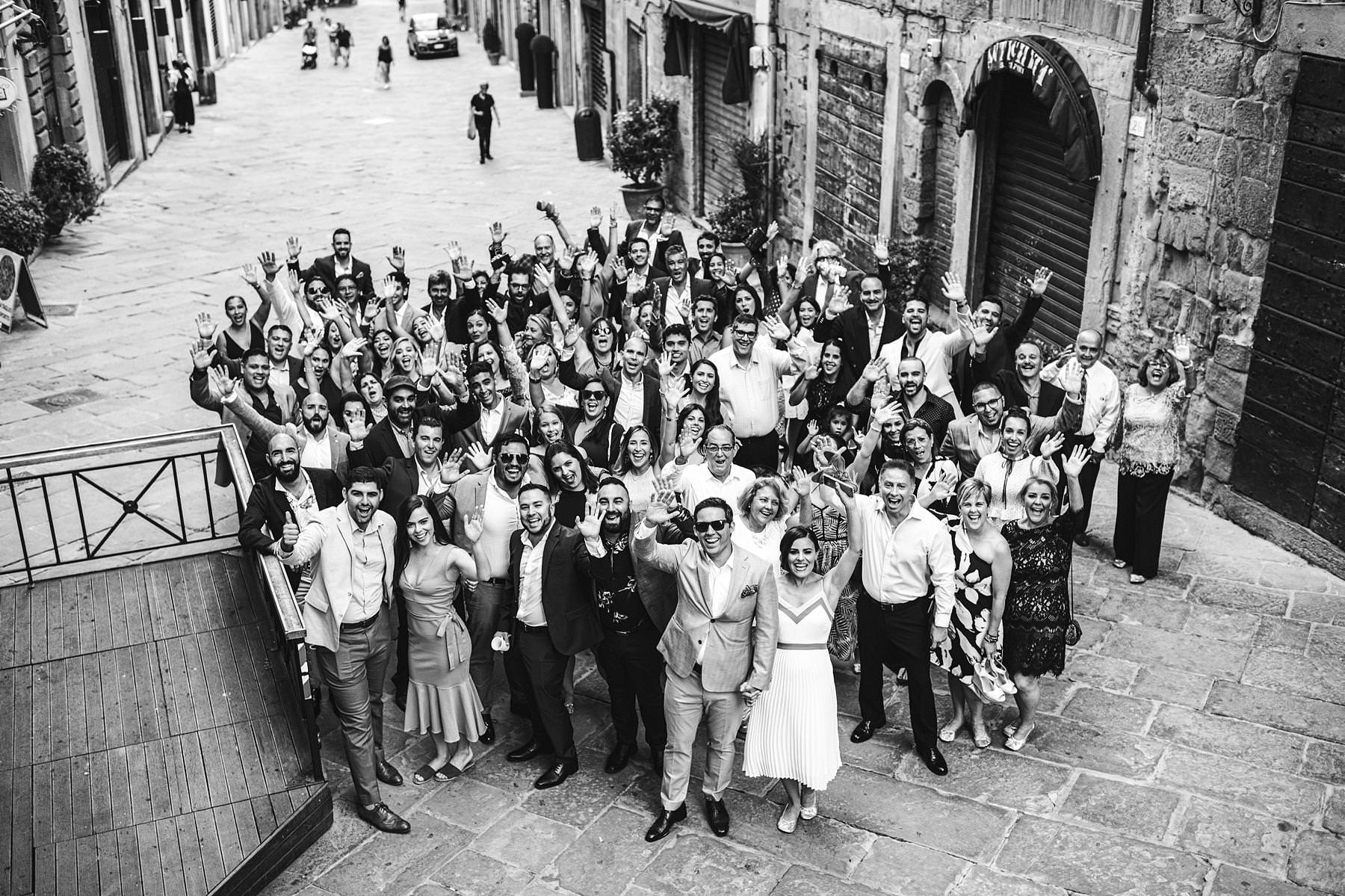 Destination wedding in Tuscany. Bride and groom welcome dinner in Arezzo at Piazza Grande