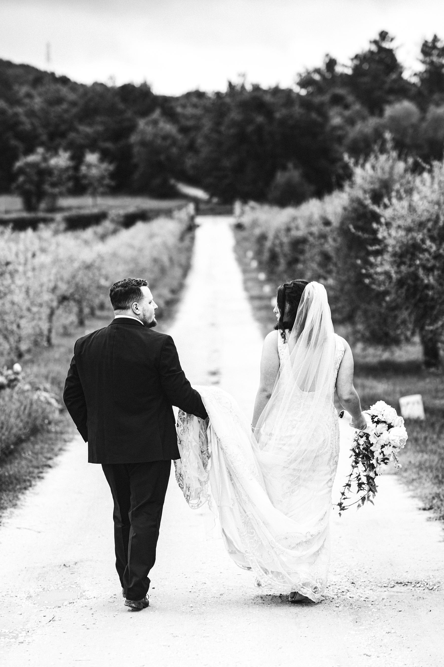 Lovely bride and groom wedding portrait at Villa Le Bolli venue in Tuscany countryside near Radicondoli medieval town
