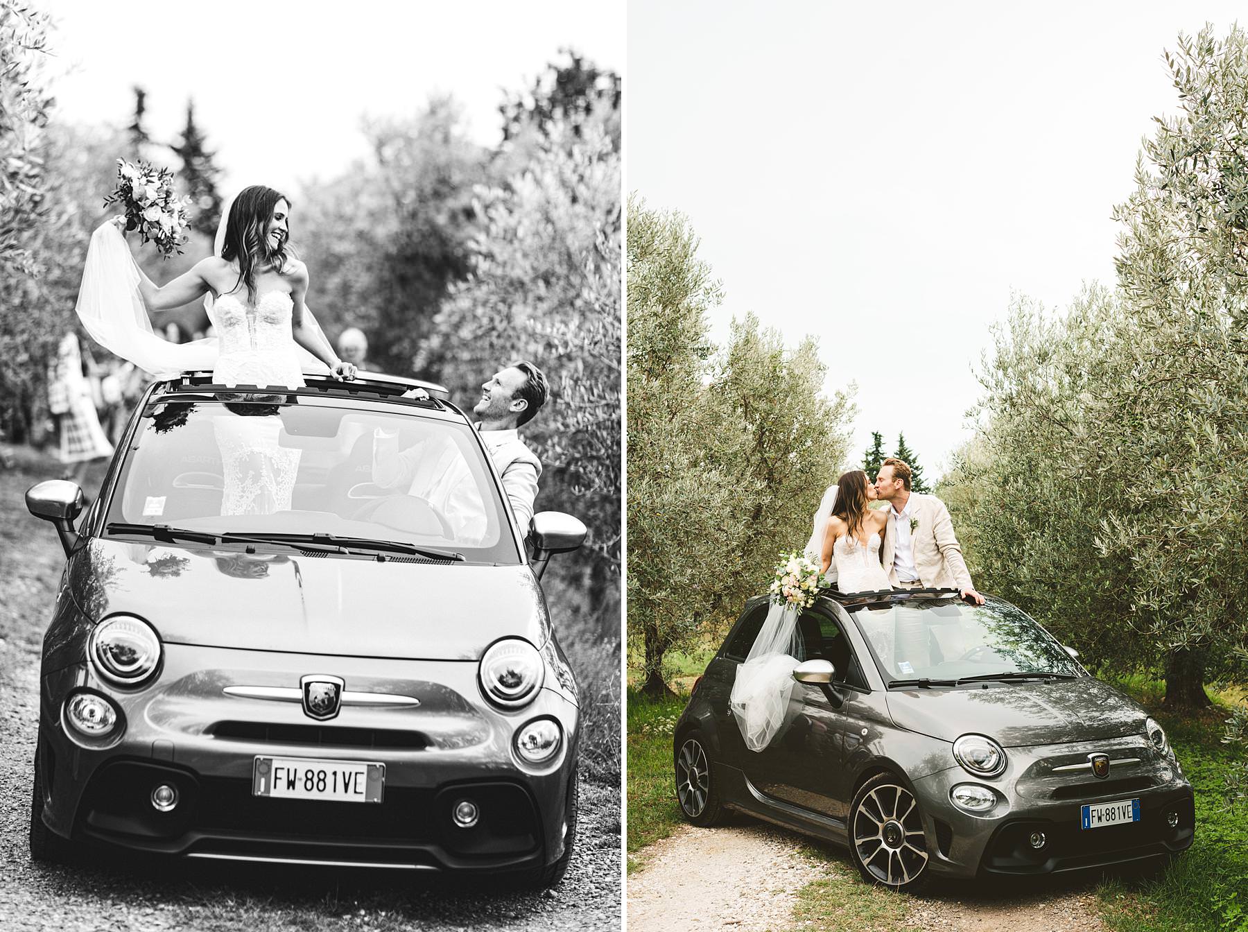 Bride and groom portrait with Fiat500 Abarth in the olive groves of Chianti near the historic residence of Villa Il Poggiale