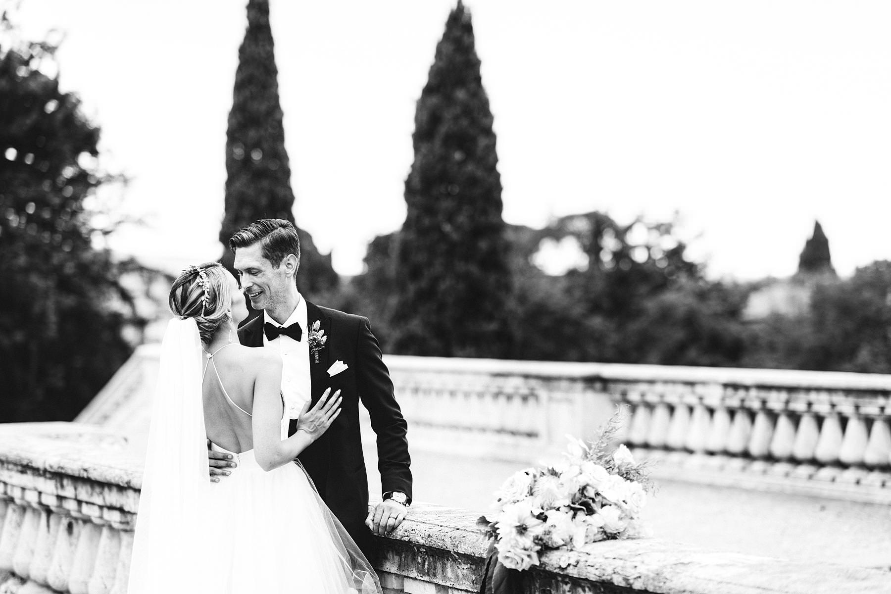 Romantic bride and groom wedding photo in Florence. Luxury destination wedding at Villa La Vedetta