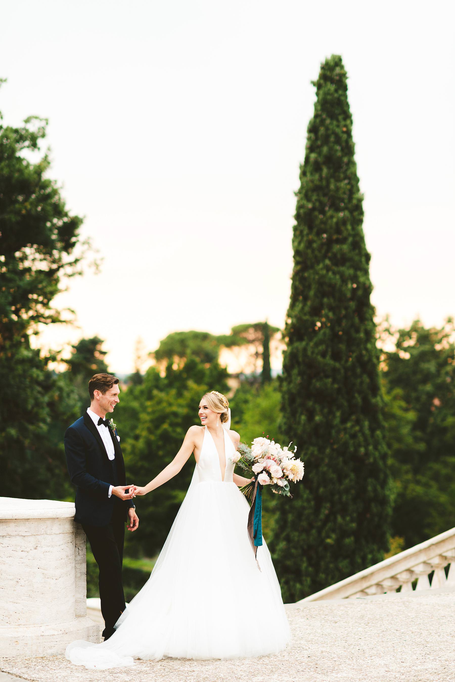 Bride and groom elegant portrait in Florence at San Miniato area. Luxury intimate destination wedding at Villa La Vedetta