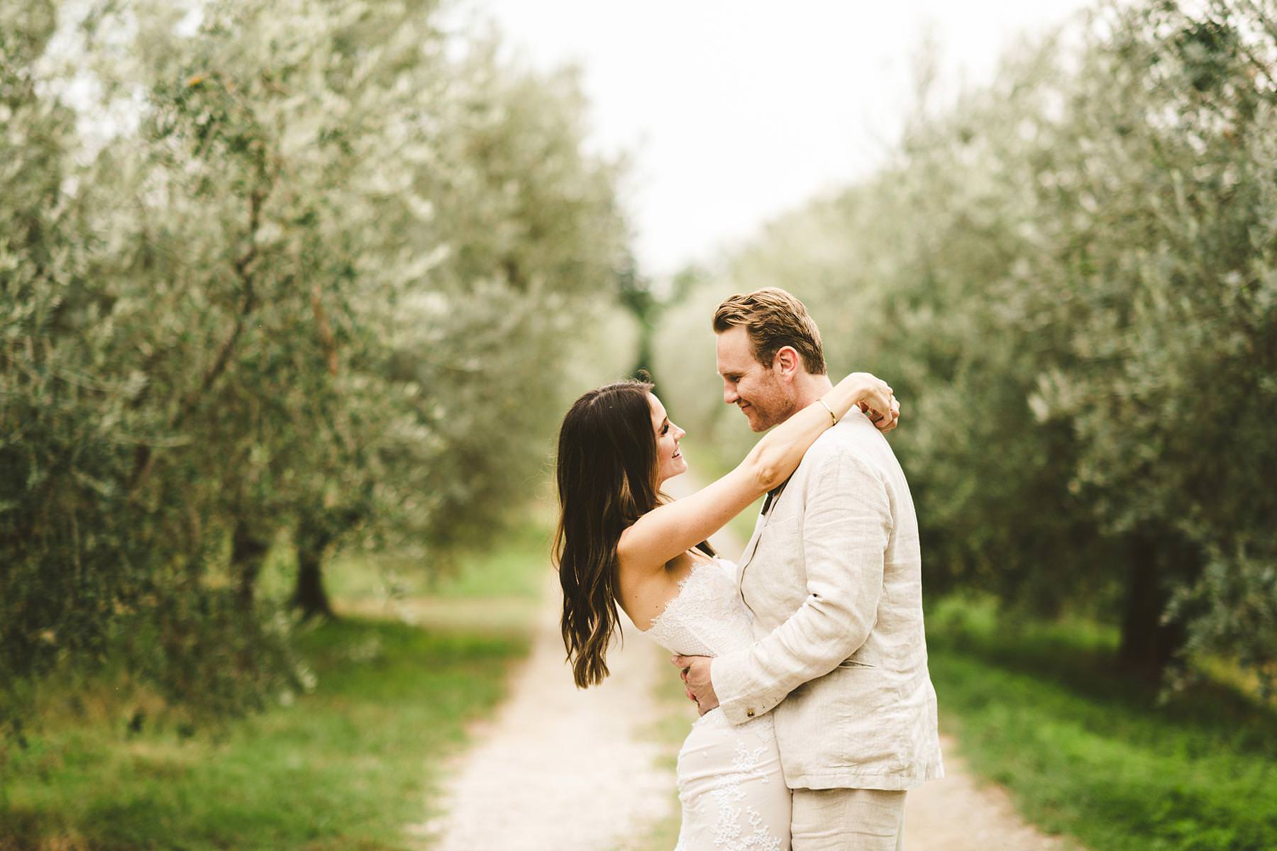 Bride and groom portrait in the countryside of Tuscany in Chianti area near the Villa Il Poggiale venue