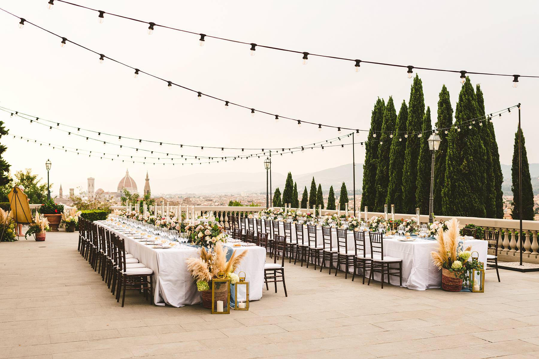 Luxury wedding with amazing view at Villa La Vedetta in Florence. Intimate luxury destination wedding dinner decoration by Stiatti Fiori and Villa La Vedetta. Every details was spotless and delightful, contributing to creating the luxury wedding bride and groom had been dreaming of