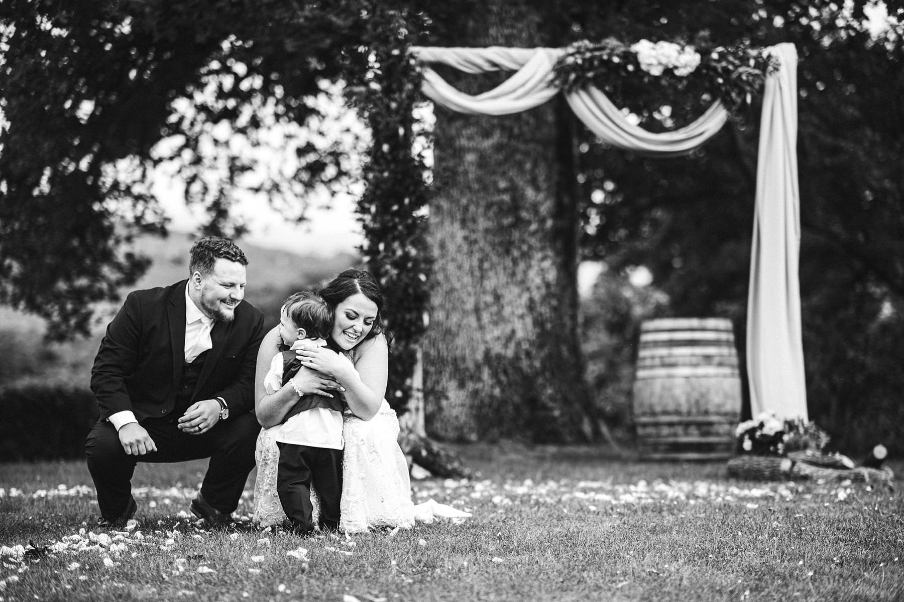 Lovely candid family shoot during destination wedding in Tuscany countryside Villa Le Bolli near Radicondoli medieval town