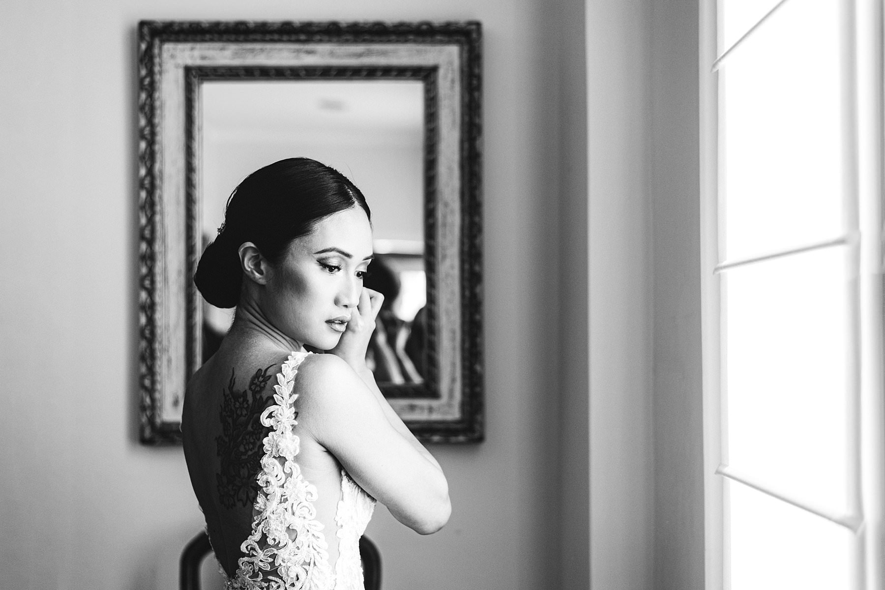 Gorgeous bride Liza in her luxury and beautiful Martina Liana wedding gown during getting ready. Intimate destination wedding in Florence