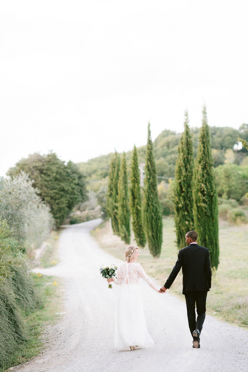 Elegant romantic intimate bride groom wedding portrait countryside Tuscany Montelucci Resort