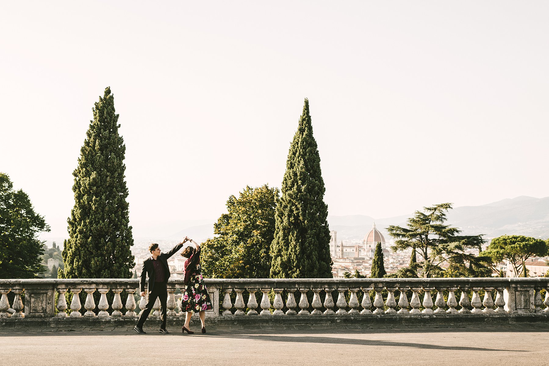 Let your engagement photographer guide you. Engagement pictures are usually romantic, but they do their best work when they turn out to be also fun and creative. Take those photos at sunset in a charming city like Florence and you will reach perfection