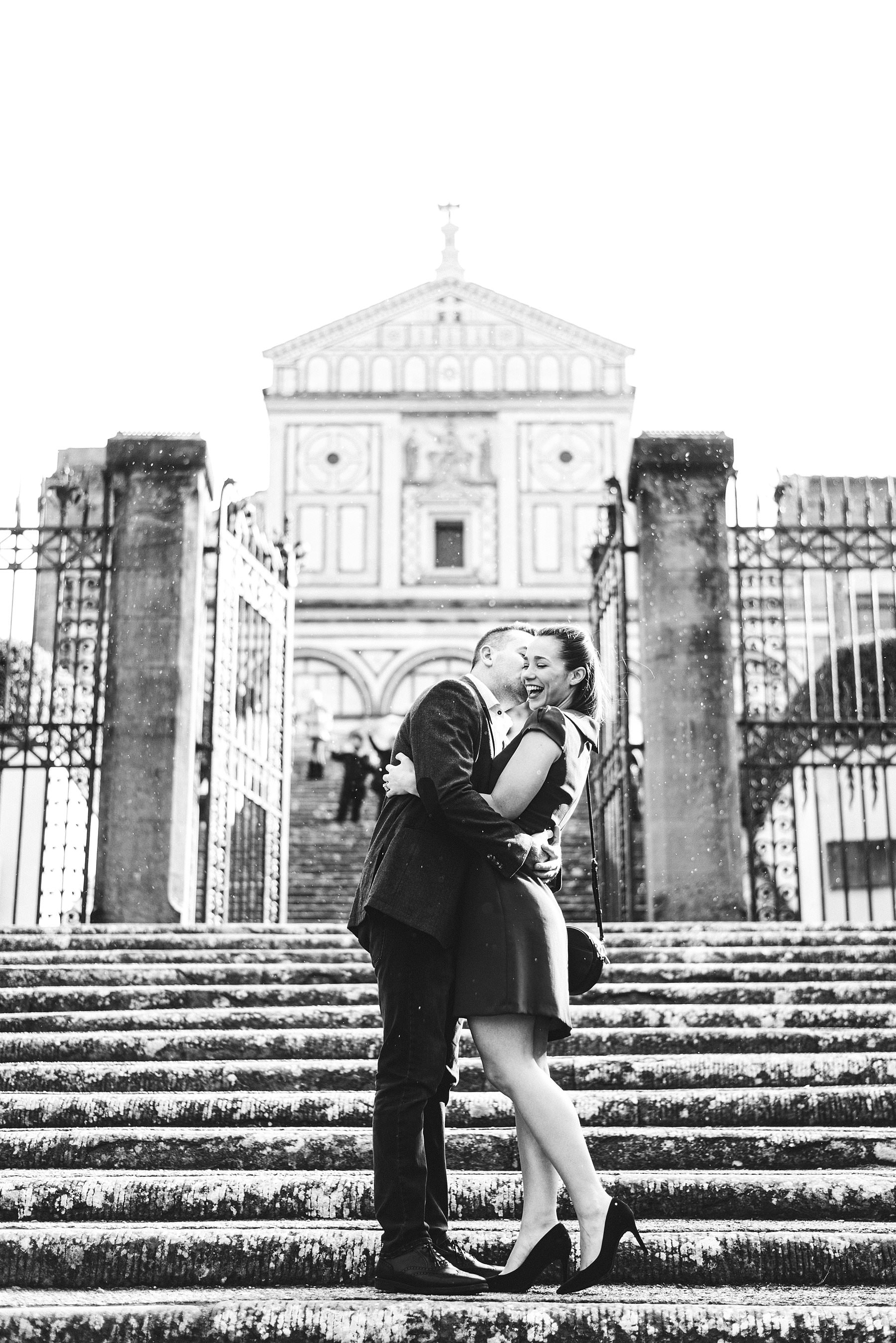 Cara and Vincent’s exciting and lovely surprise proposal and photoshoot under light rain at San Miniato al Monte near Piazzale Michelangelo in Florence