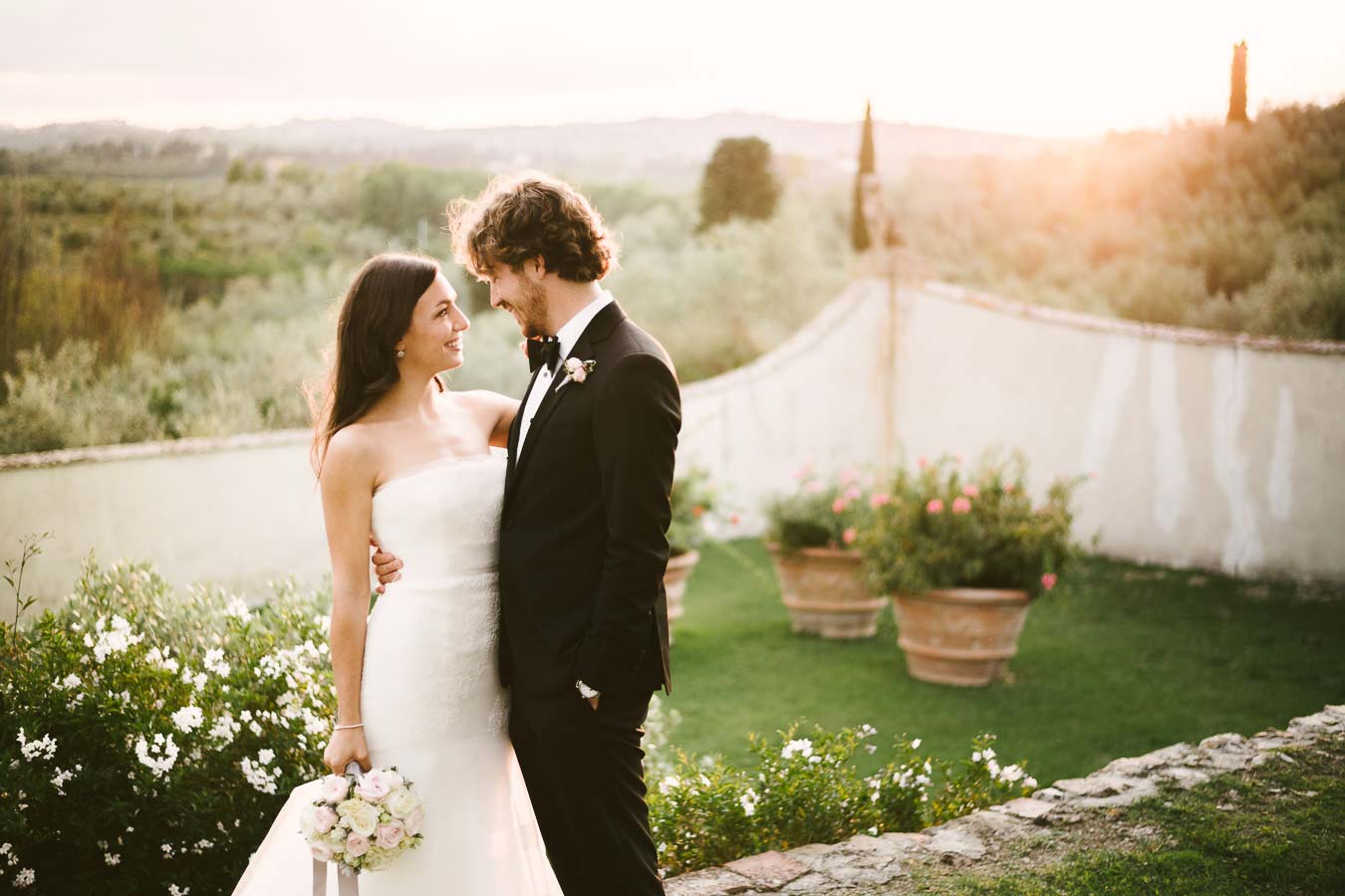Gorgeous elegant bride in Vera Wang gown and groom wedding portrait at Villa Medicea di Lilliano Wine Estate which is one of my favourite Italy wedding venues into Florence countryside