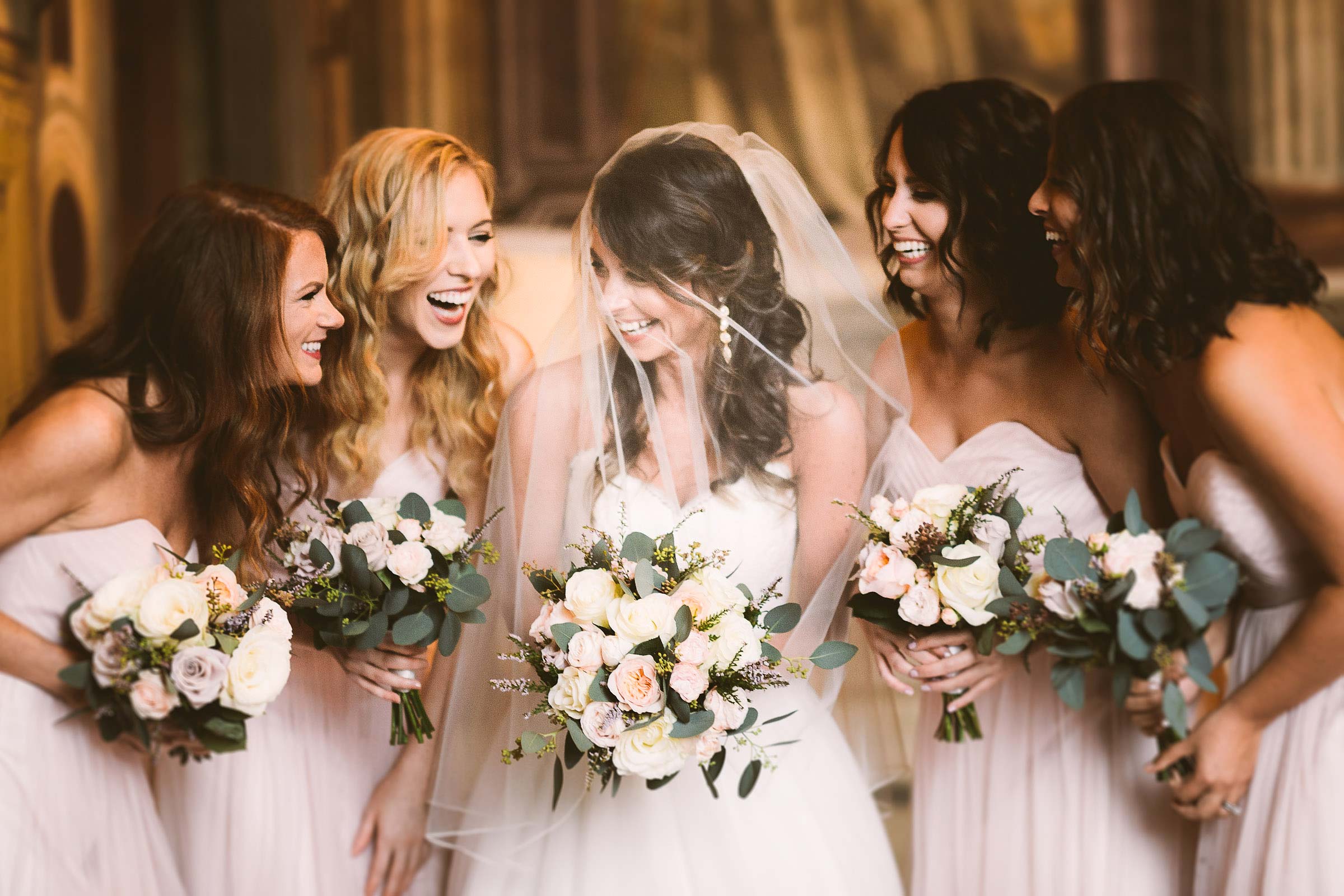 Bridal party portrait and lovely candid moment into Palazzo Pubblico in Siena for a beautiful intimate destination wedding