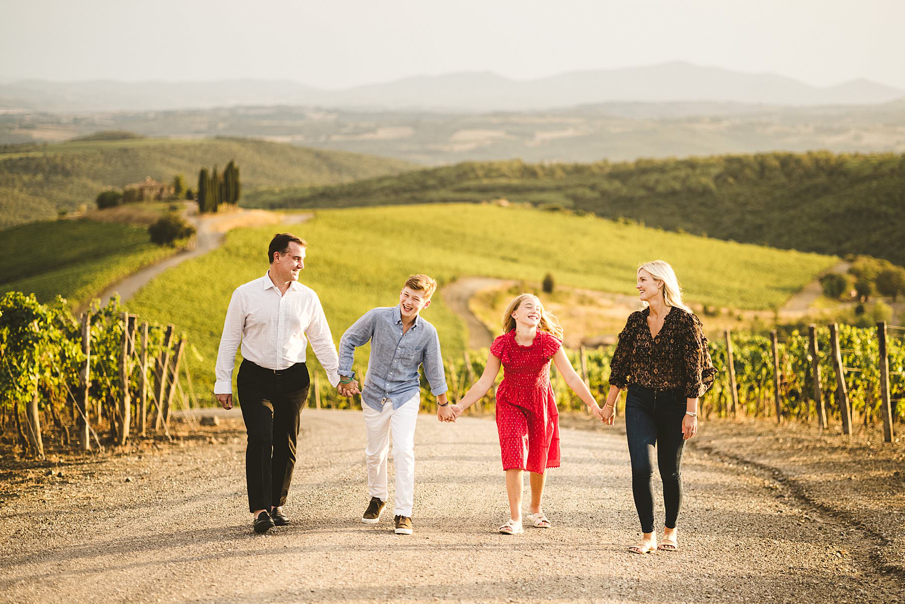 Jacqueline, Clayton and their children are a smiling American family, who enjoyed a beautiful holiday at luxury resort of Rosewood Castiglion del Bosco