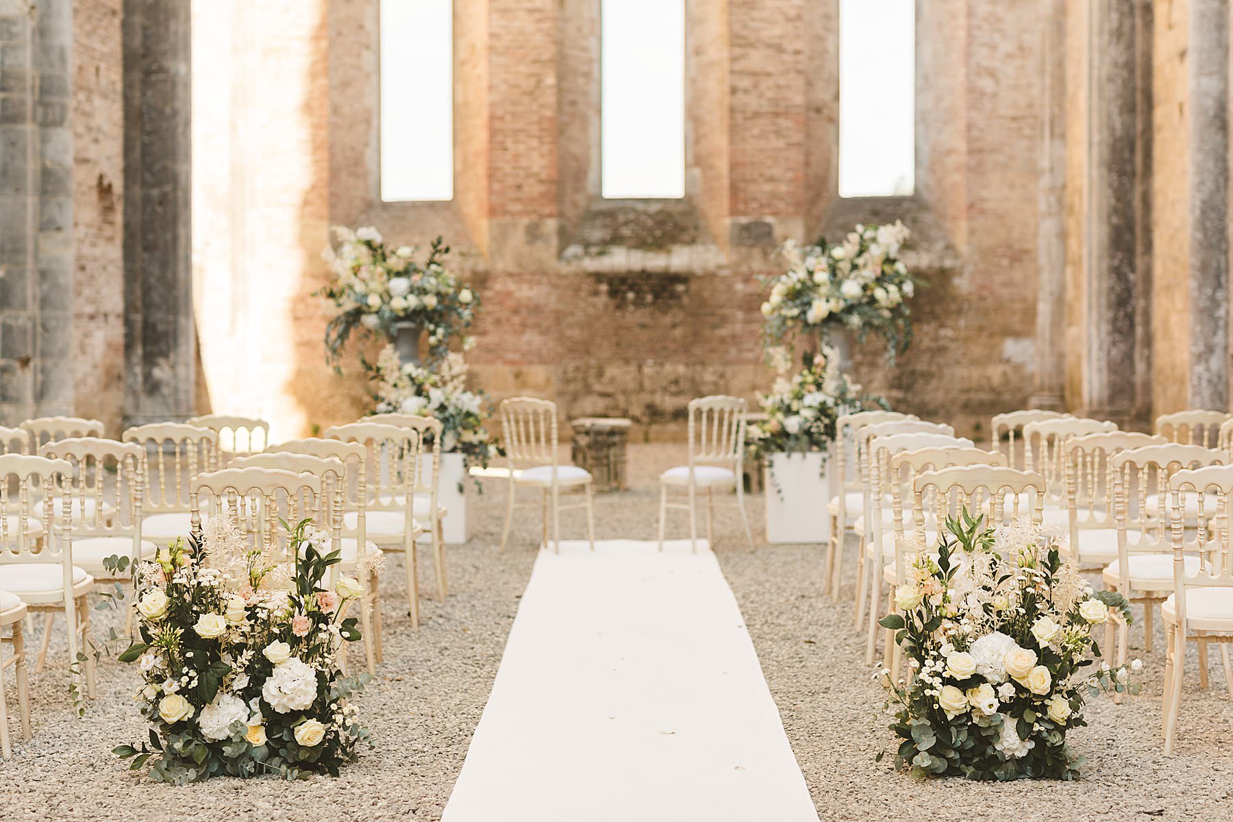 Unforgettable and elegant intimate destination wedding at Roofless Abbey of San Galgano near Siena