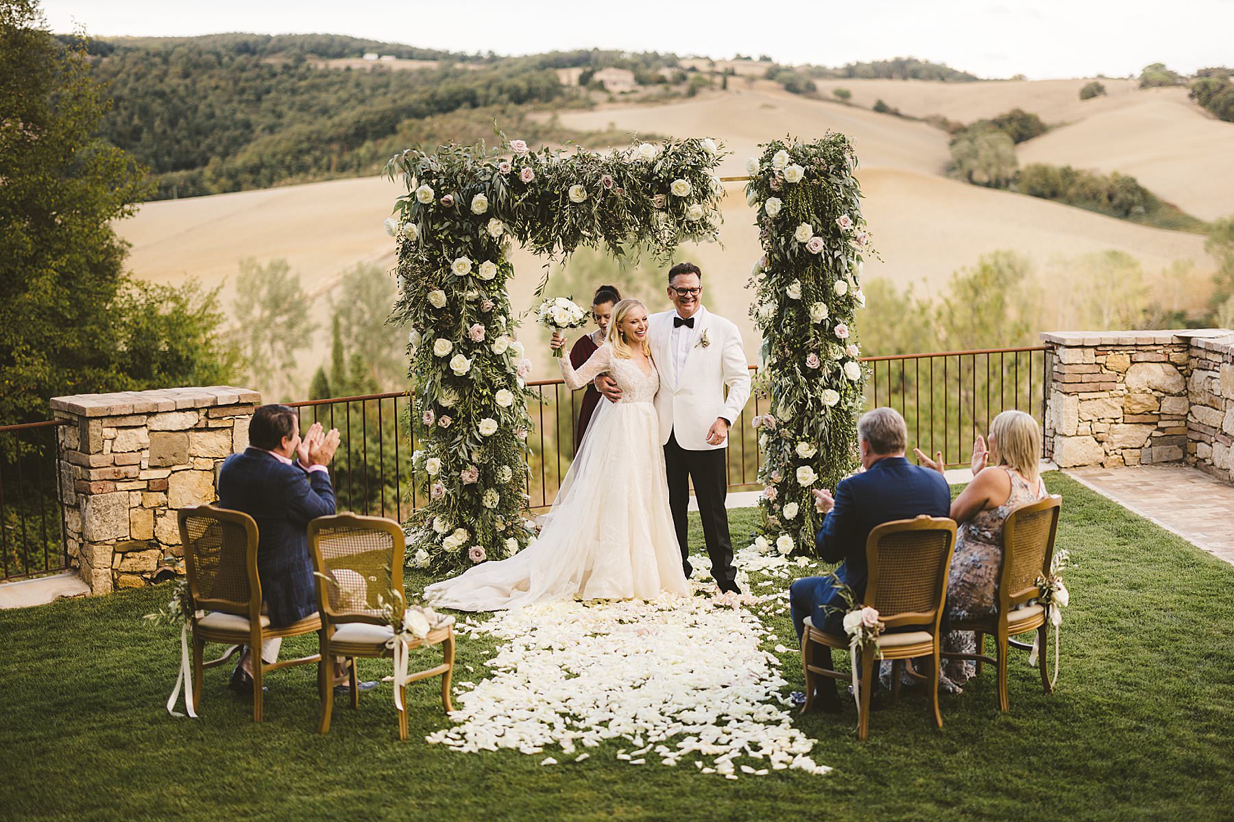 Very private elopement ceremony with breathtaking view of countryside of Tuscany at Borgo Pignano