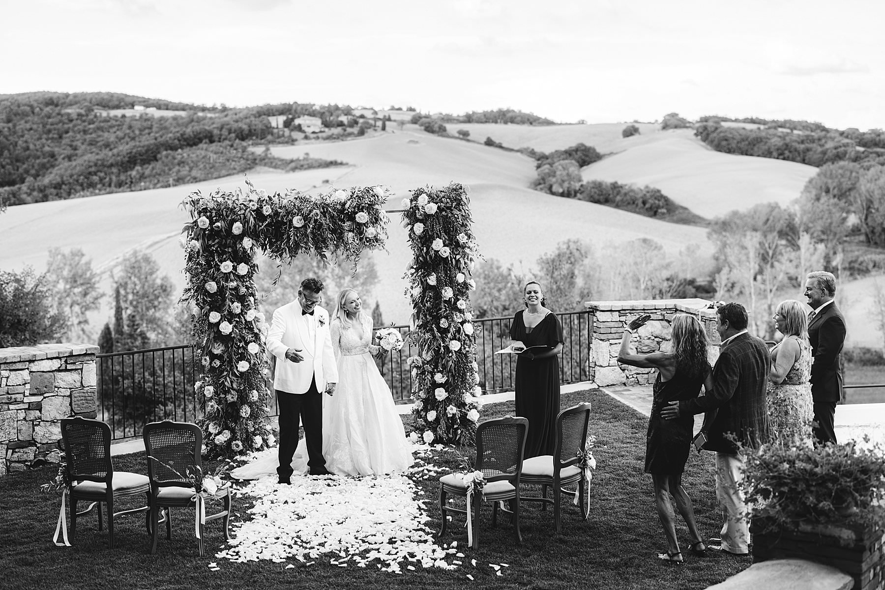 Exclusive intimate elopement in Tuscany at Borgo Pignano with breathtaking countryside view