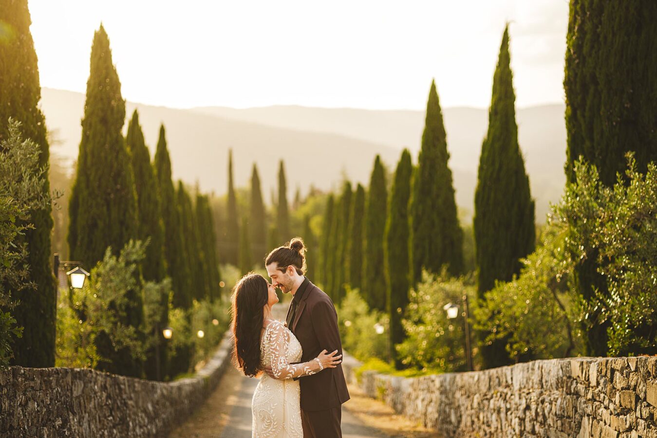 Fairy tale elopement photos at Meleto Castle, Tuscany countryside in the evocative picturesque cypress lined path