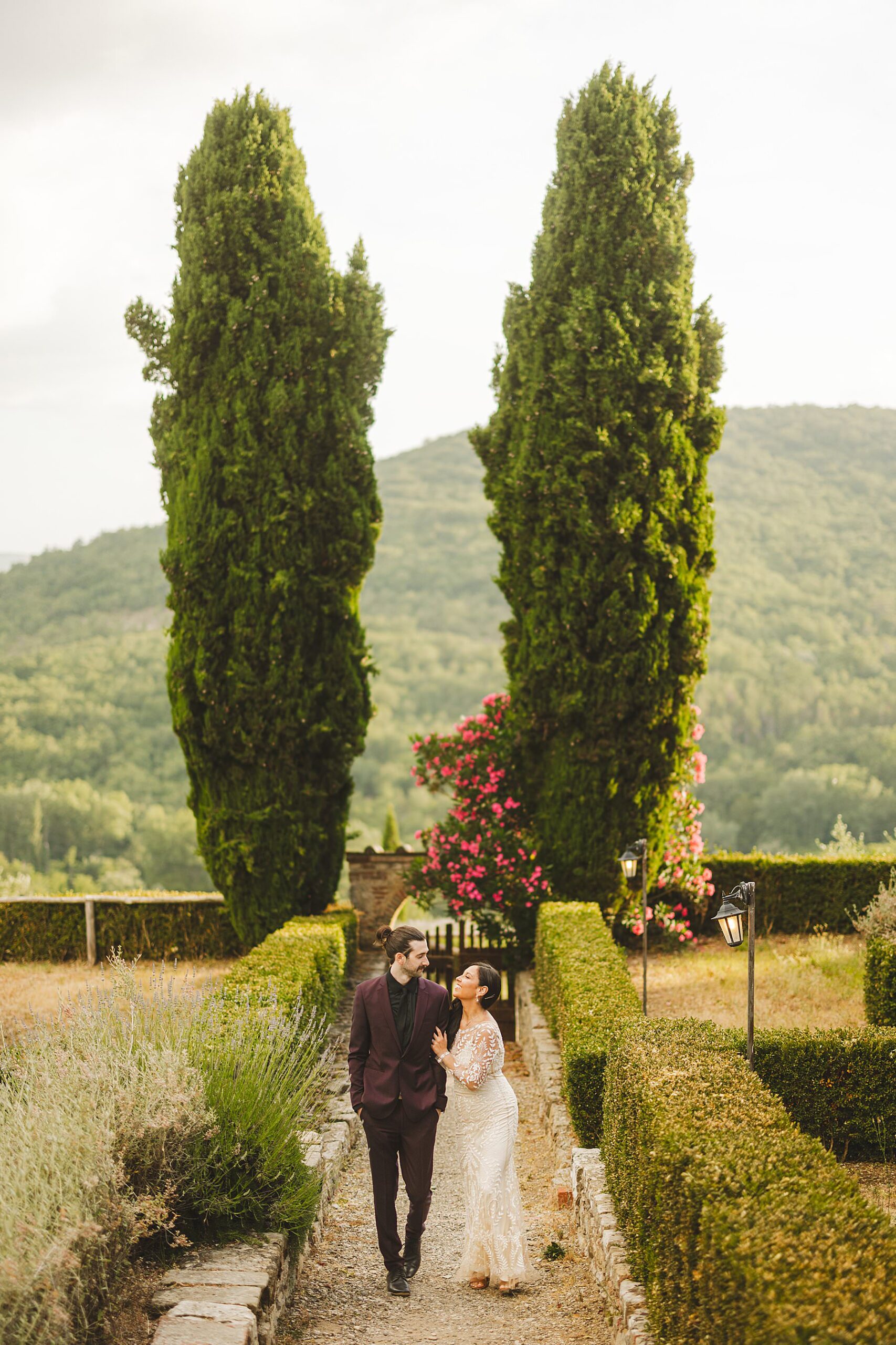 Dreamy elopement bride and groom candid photo in lovely Meleto Castle