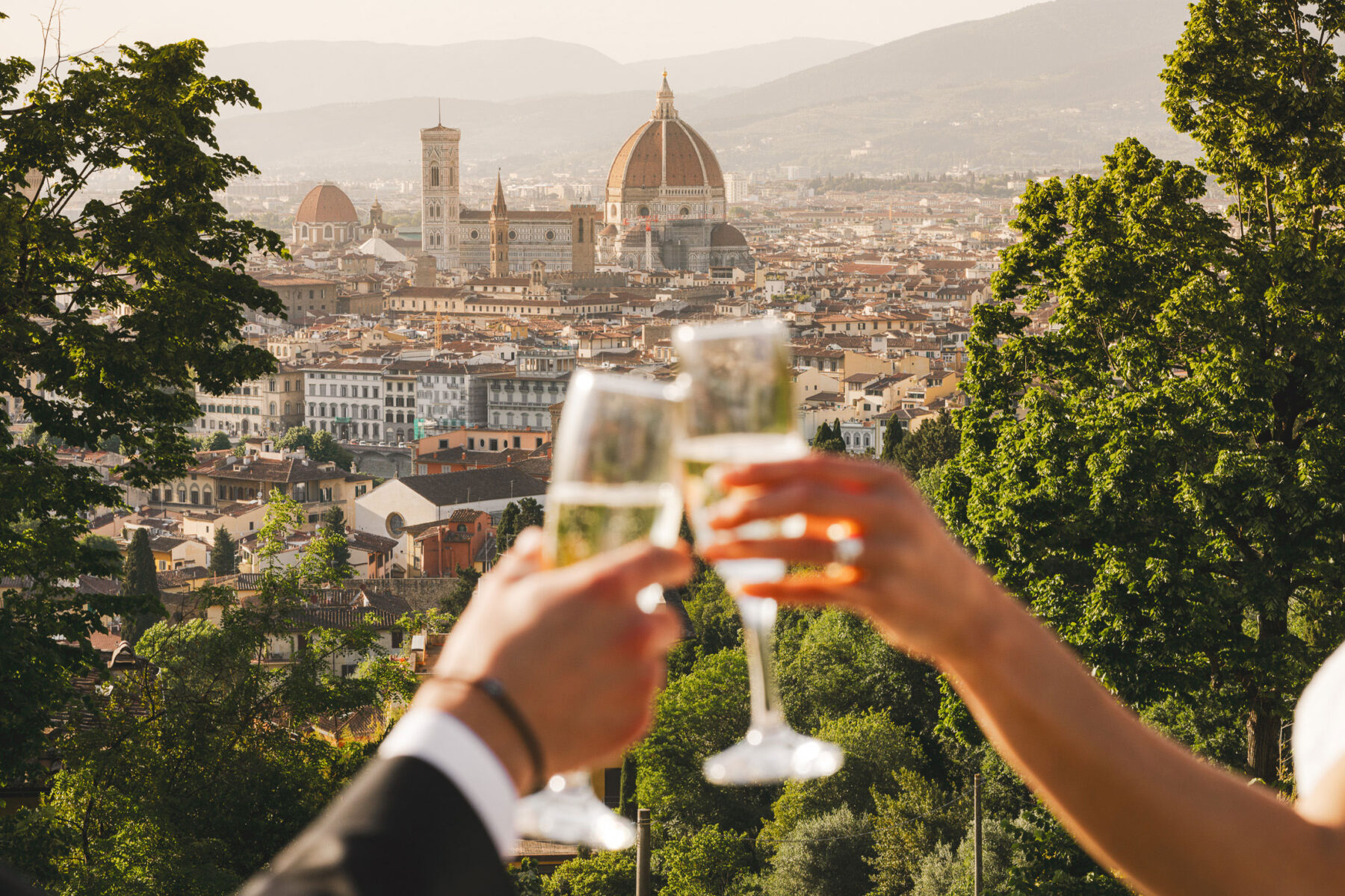 Post-wedding photo shoot joy in Florence with champagne celebration
