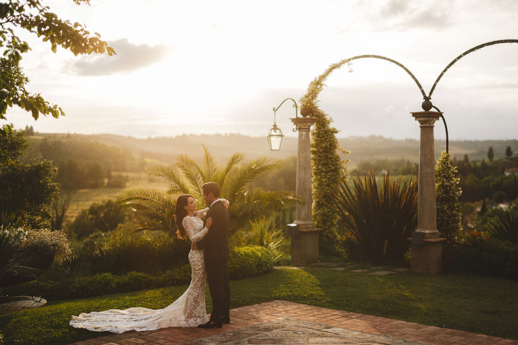 Bride and groom elegant wedding portrait during golden hour at Tenuta Corbinaia in Tuscany countryside