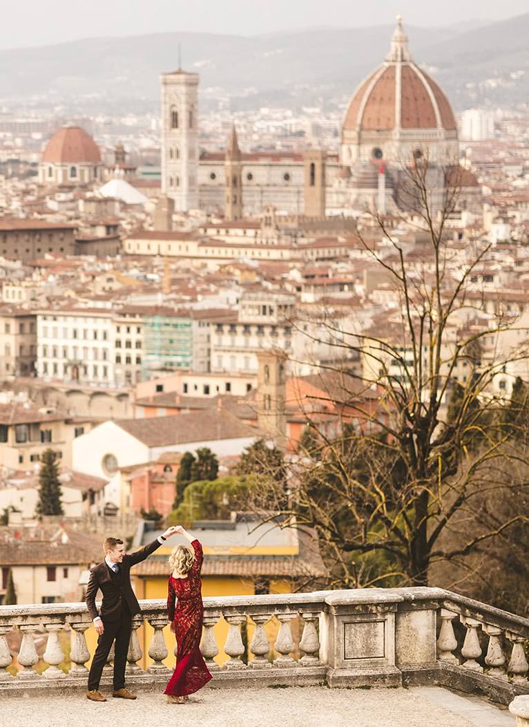 Wedding vow’s renewal anniversary photos in Florence with bright-red Alfa Romeo spider an unforgettable celebration