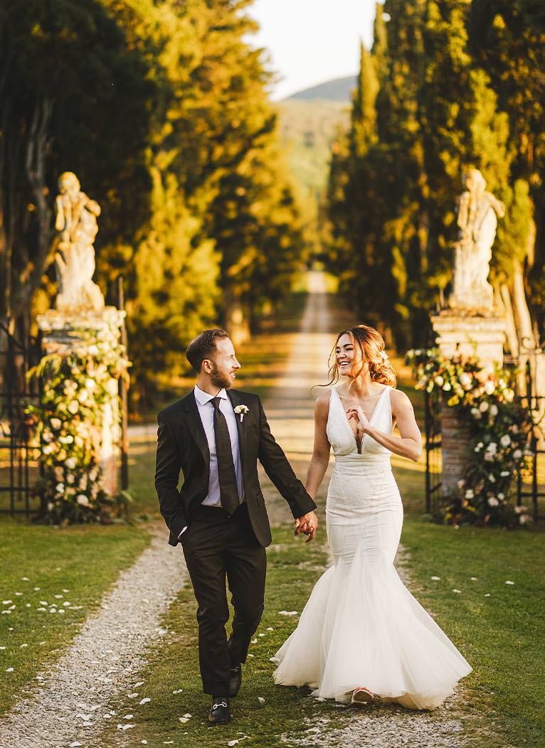 Elegant bride and groom wedding photo shoot at breathtaking Borgo Stomennano during golden hour