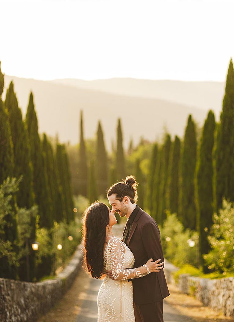 Fairy tale elopement photos at Meleto Castle, Tuscany countryside in the evocative picturesque cypress lined path