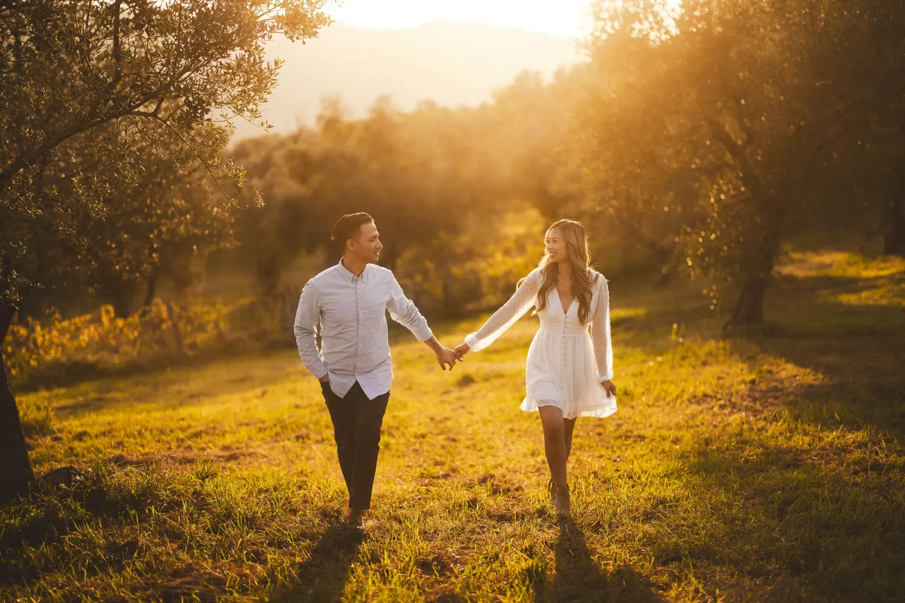 Enchanting prewedding photograph in Chianti countryside taken at golden hour