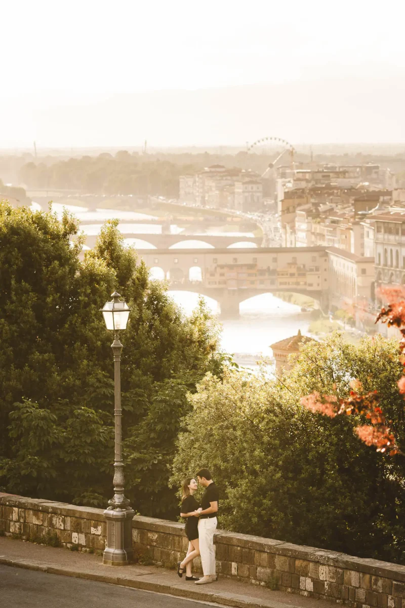 Engagement photo shoot in Florence during sunset at most iconic panoramic location near Piazzale Michelangelo