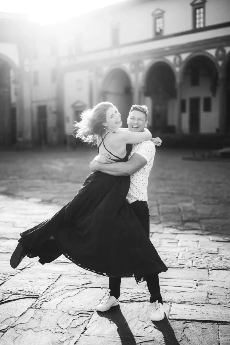 Exciting and fun couple engagement photo session in the heart of Florence at sunrise