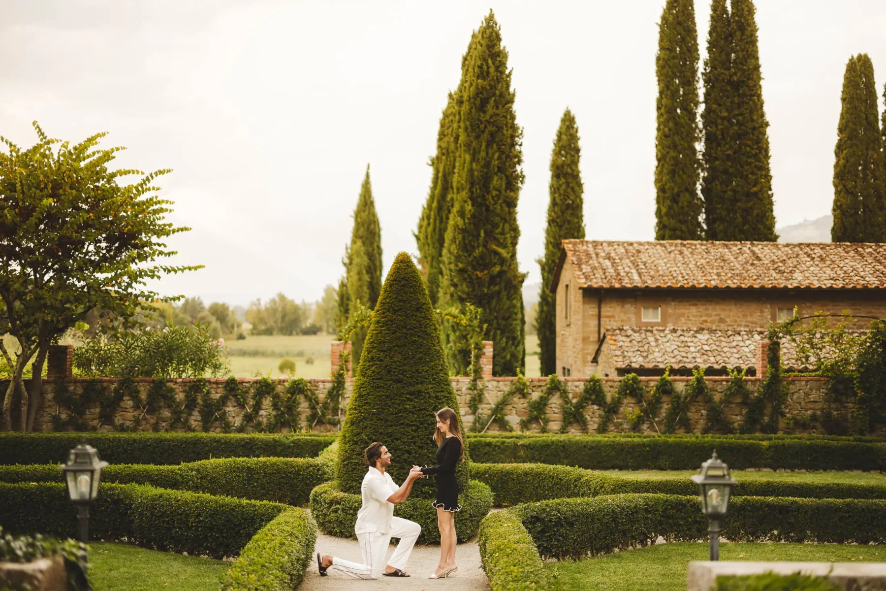 Secret proposal photo session at Villa di Piazzano in Umbria in the Italian style garden