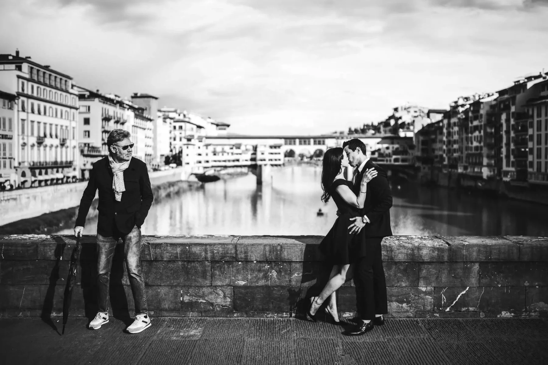 Stylish, candid and elegant photo in Florence at Ponte Vecchio in the very heart of Florence
