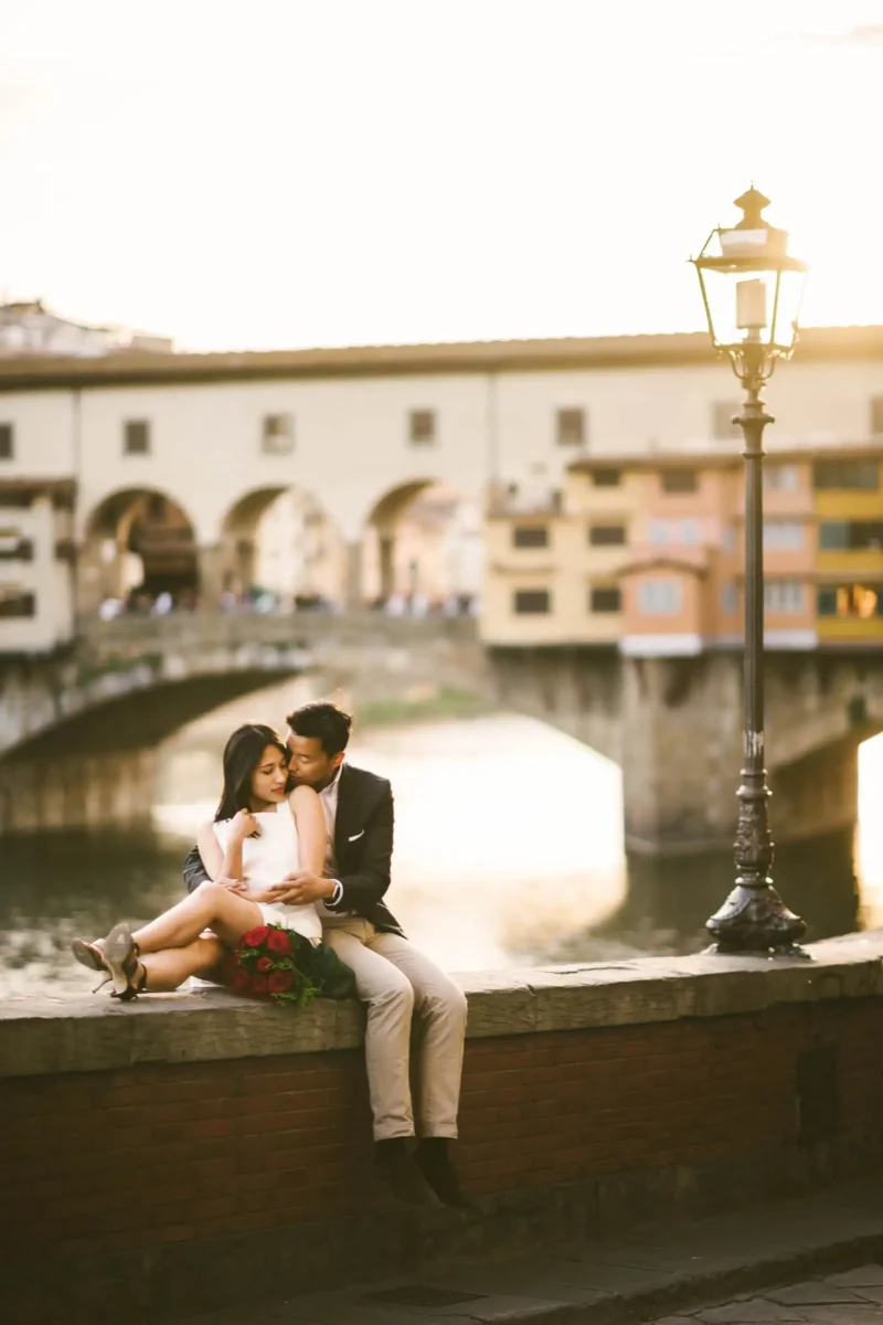 Vacation photo shoot in Florence near Ponte Vecchio at sunset time