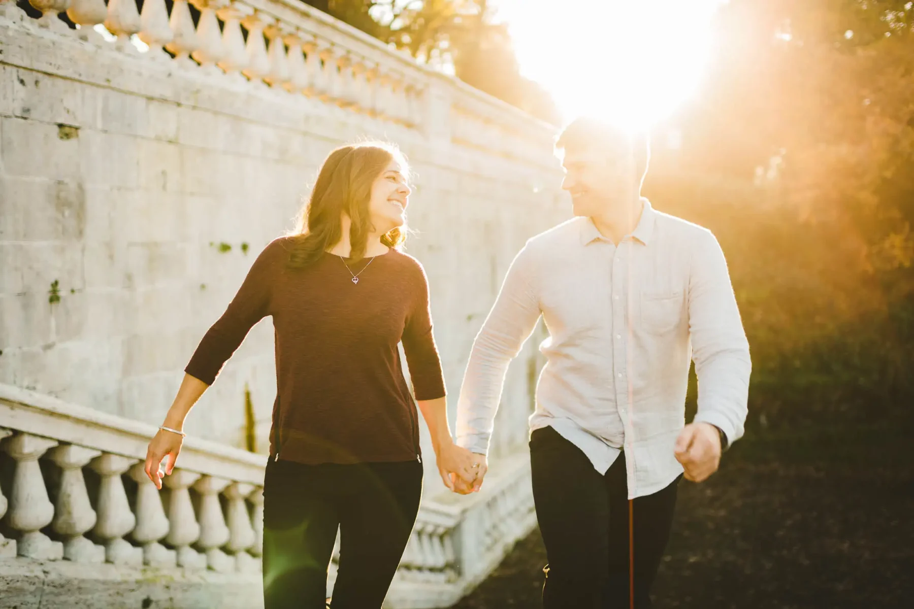 Exciting australian couple portrait candid photo in Florence San Miniato al Monte Golden hour
