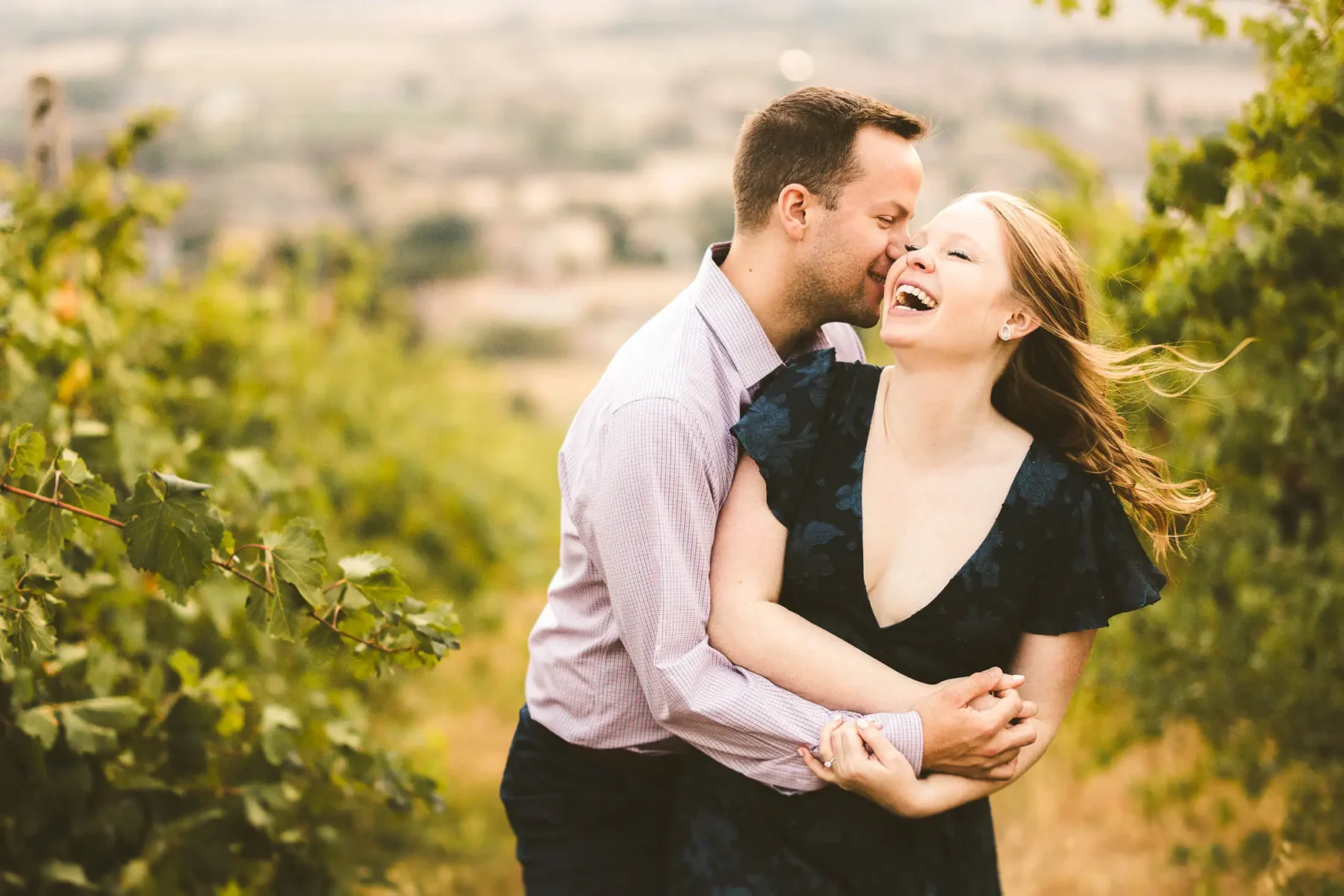 Exciting and fun Couple portrait engagement photo session at Tili 21, an organic winery embraced by century-old vineyards and olive groves