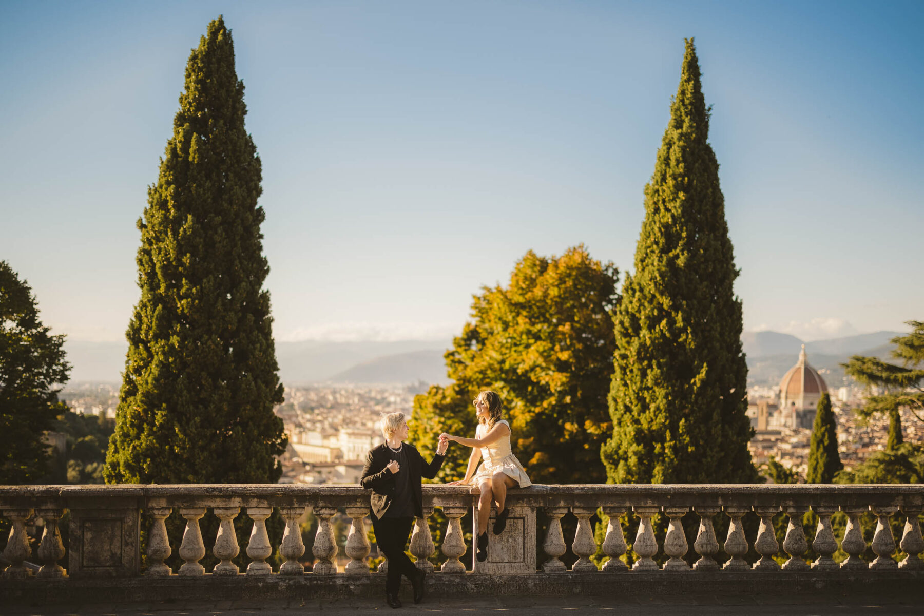 Surprise engagement photos and video in Florence, Italy. Elegant and unforgettable couple portrait experience
