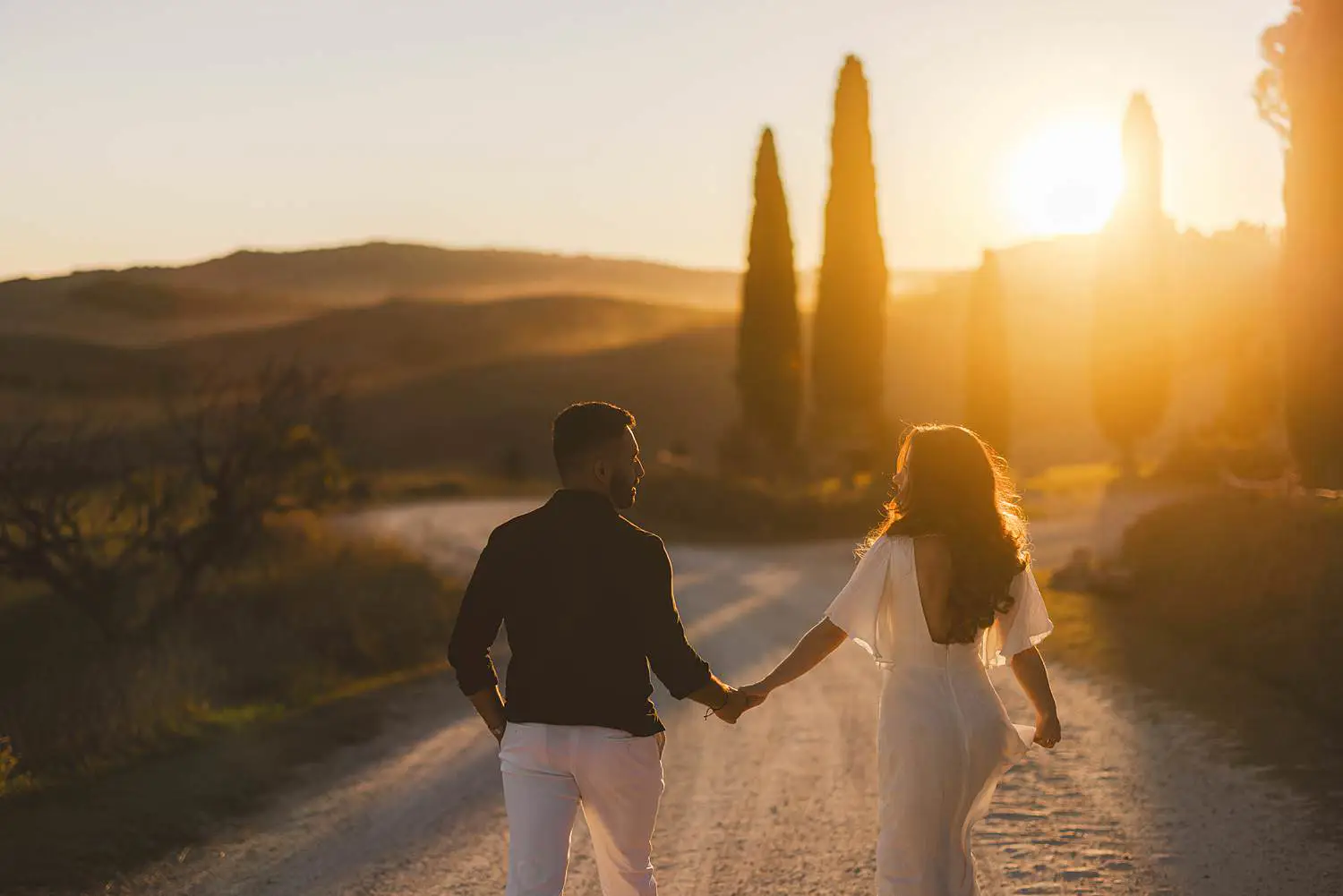 Romantic and visually stunning dreaming countryside area of Pienza offers the best location for an engagement photo shoot