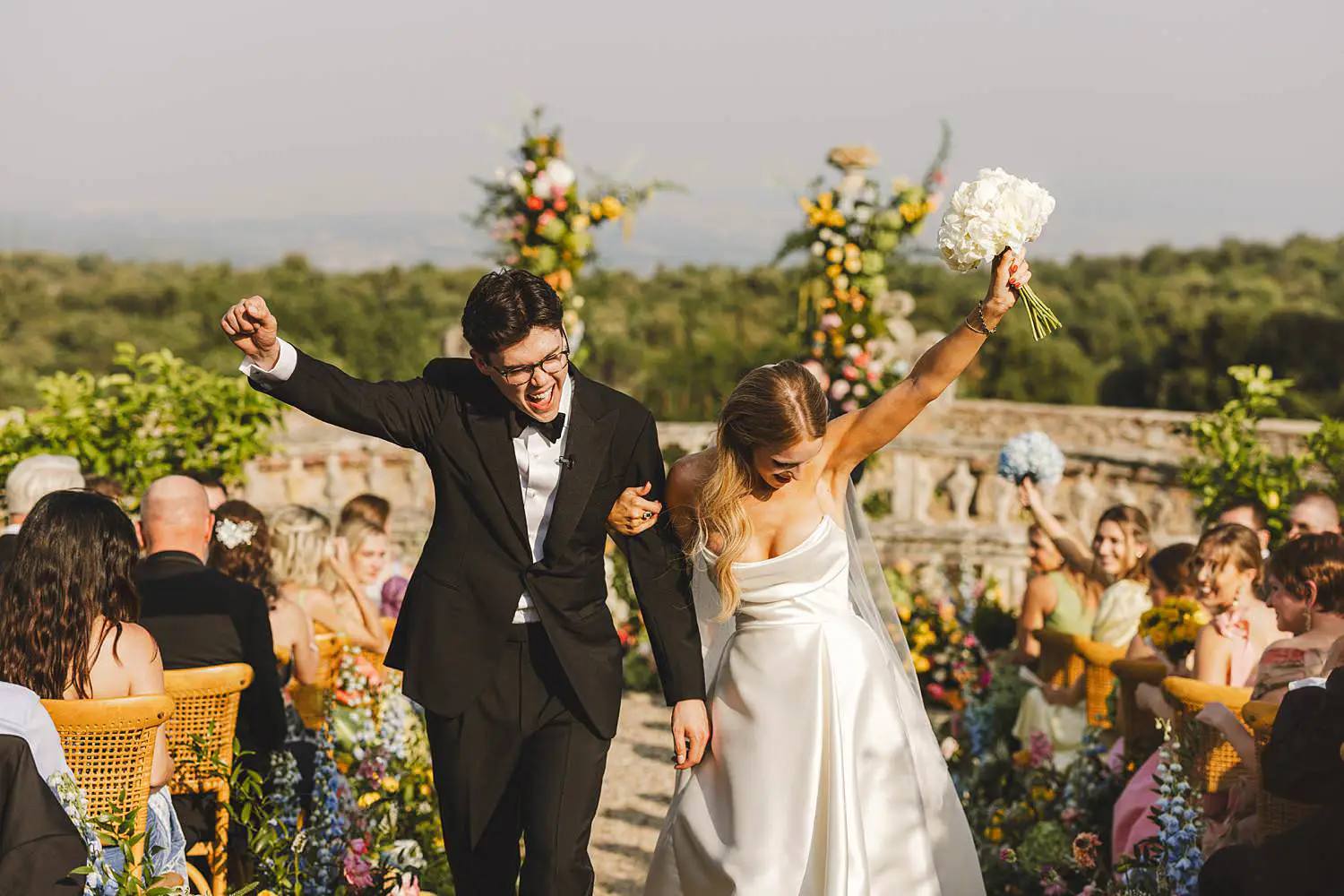 Excited bride and groom are finally get married in Tuscany at Castello di Celsa