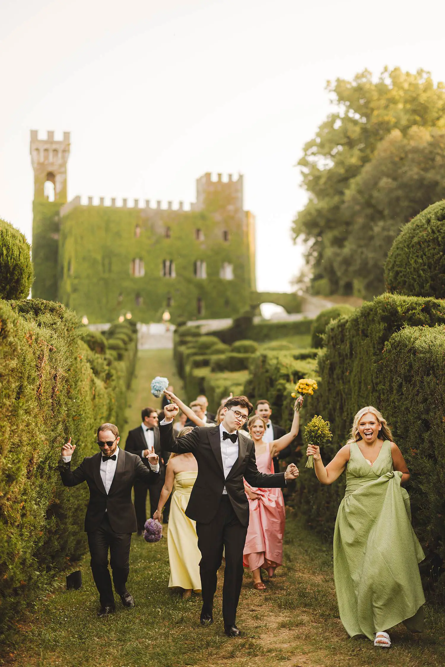 Bridal party fun moment at luxury Castello di Celsa wedding in Tuscany