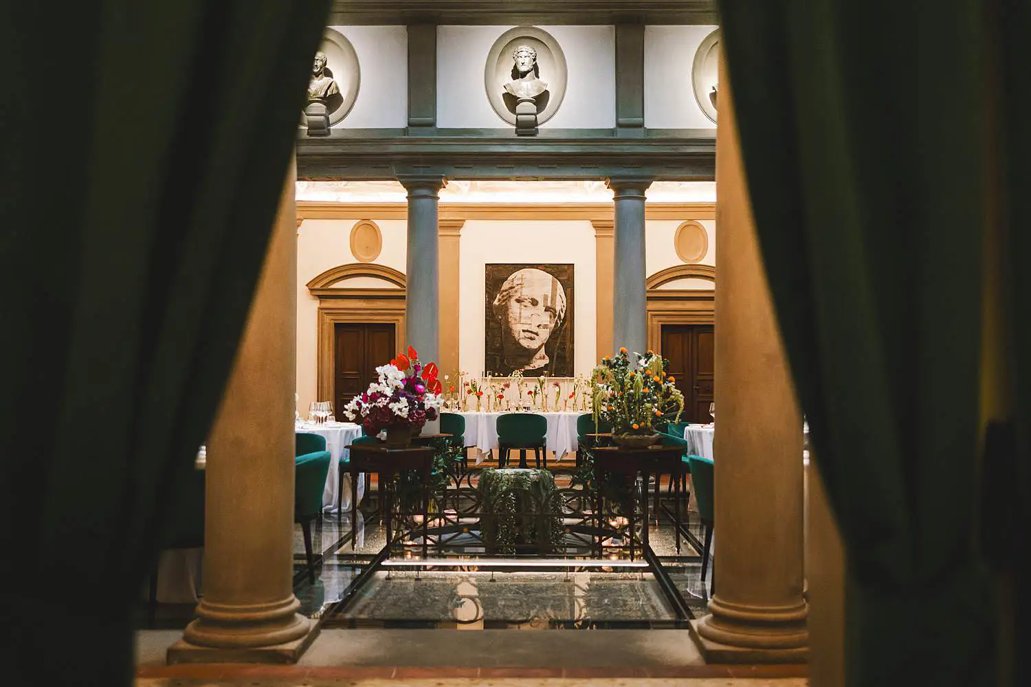 Luxury and elegant rehearsal dinner setup at Atto di Vito Mollica restaurant in Palazzo Portinari Salviati in Florence