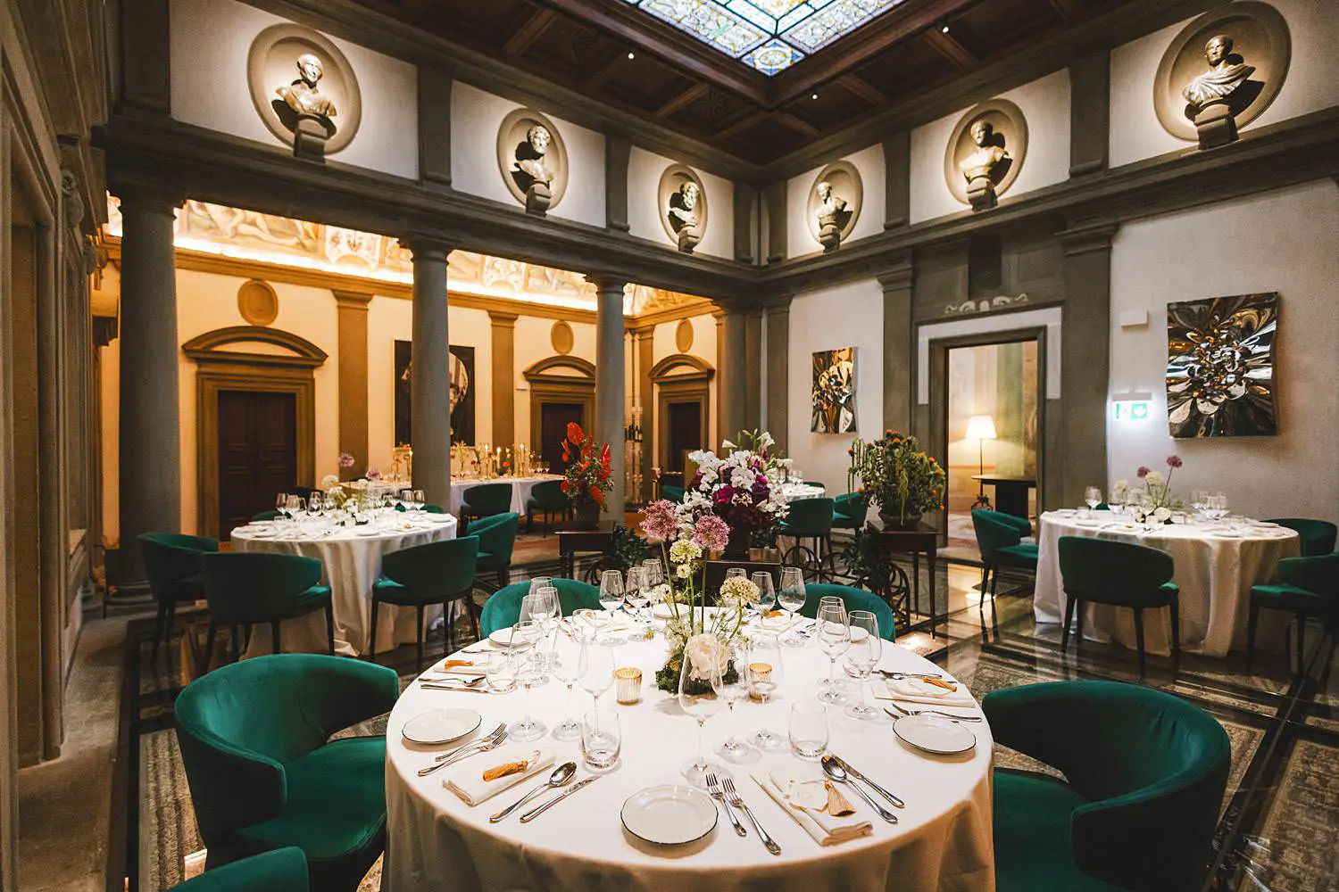 Luxury and elegant rehearsal dinner setup at Atto di Vito Mollica restaurant in Palazzo Portinari Salviati in Florence