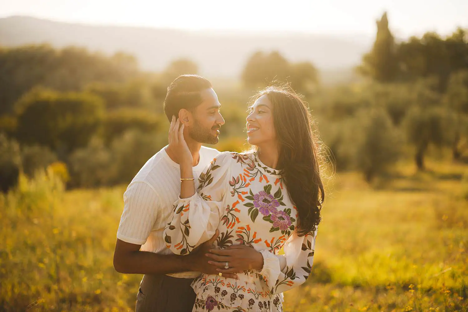 Romantic golden hour photo session among olive trees in the Chianti countryside