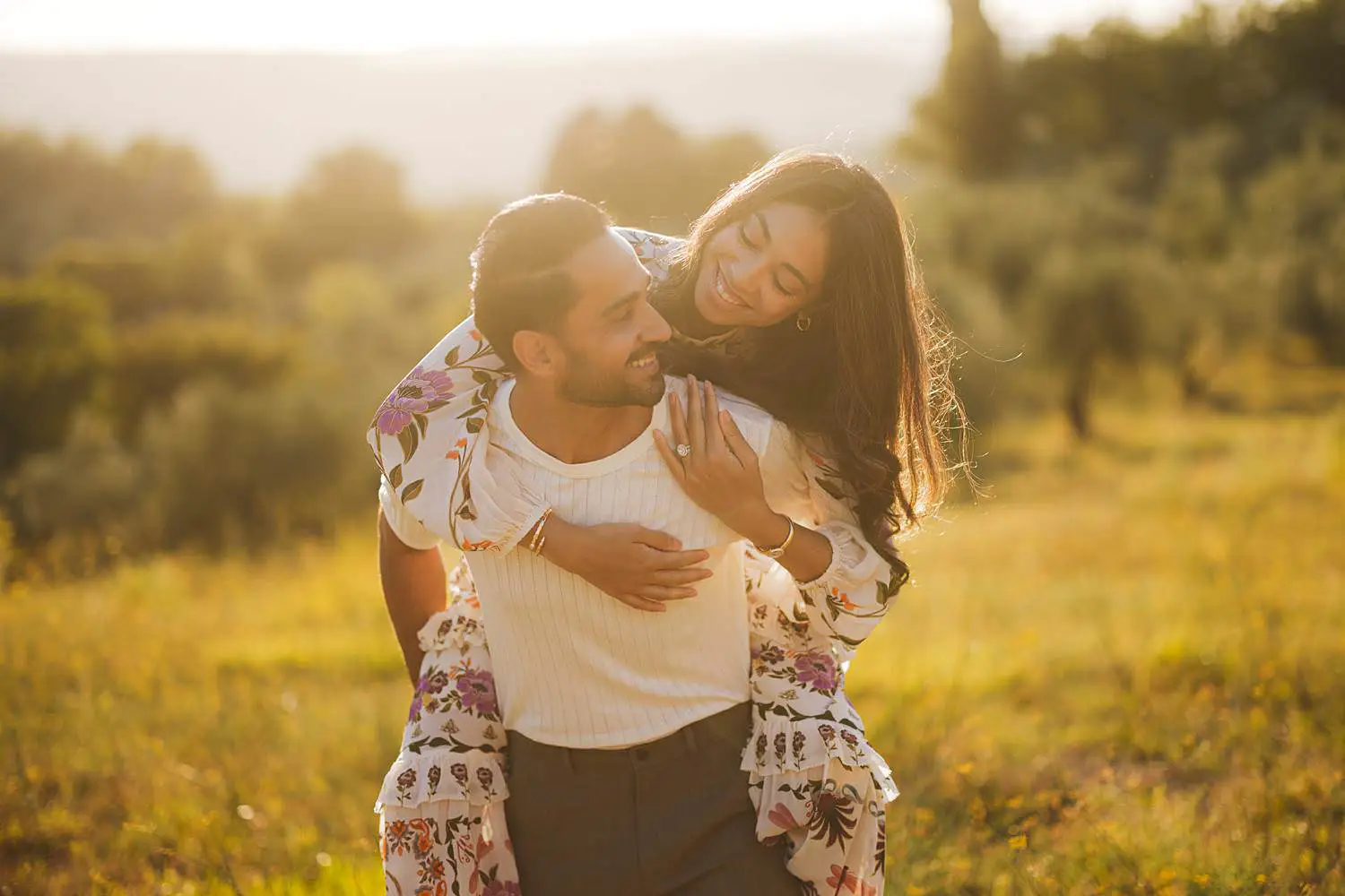 Exciting and fun golden hour photo session among olive trees in the Chianti countryside