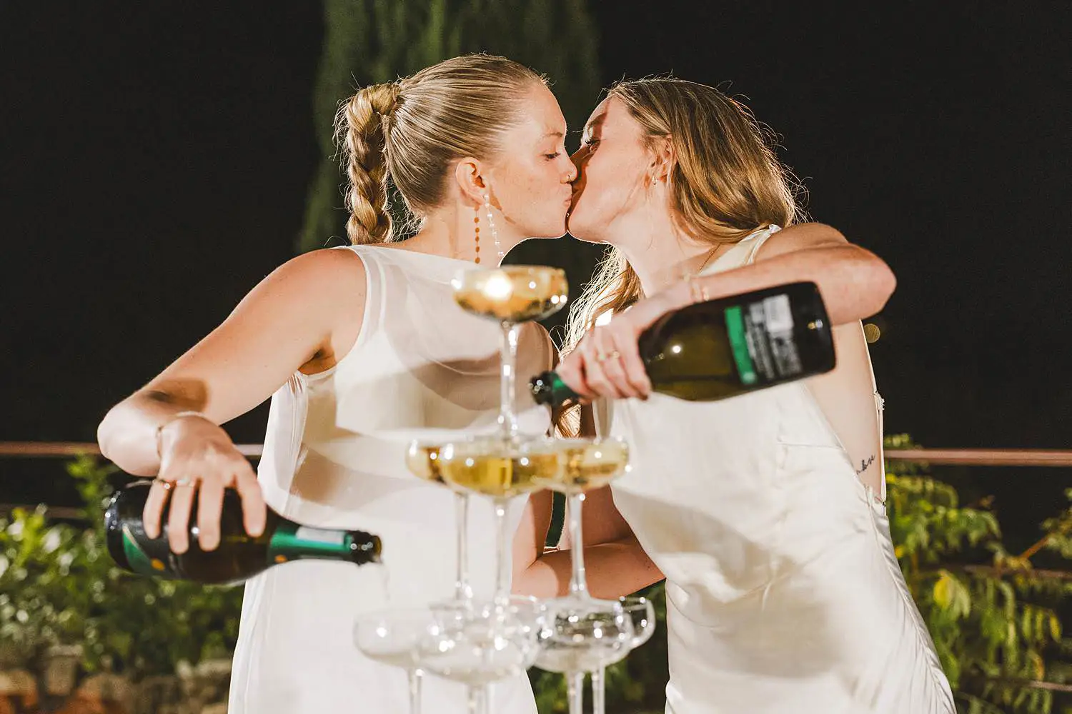 Lovely and exciting champagne tower celebration for a same sex destination wedding to remember in Tuscany at Borgo di Petrognano
