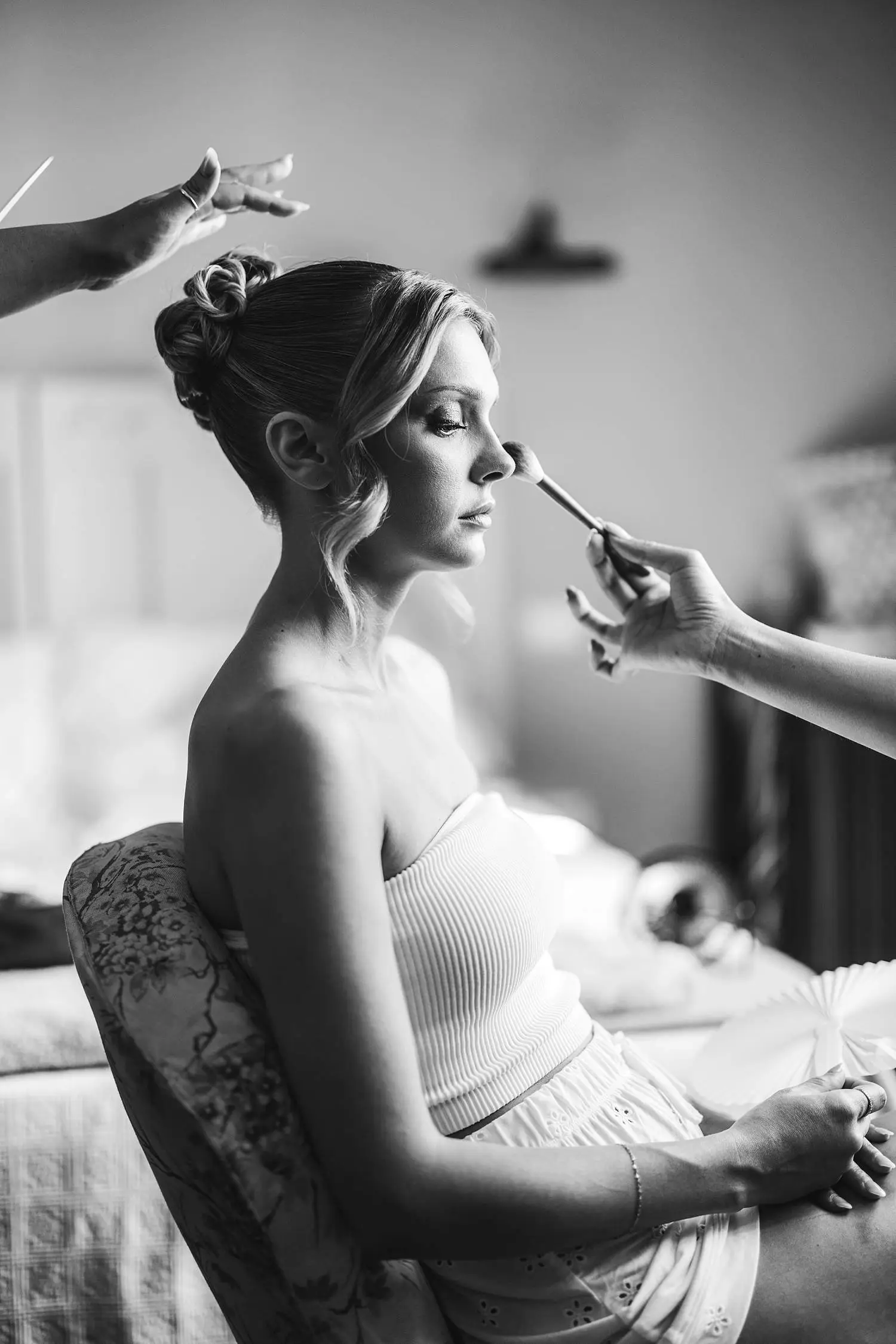 Beautiful bride candid photo during touch up at Villa Belvedere in Loro Ciuffenna
